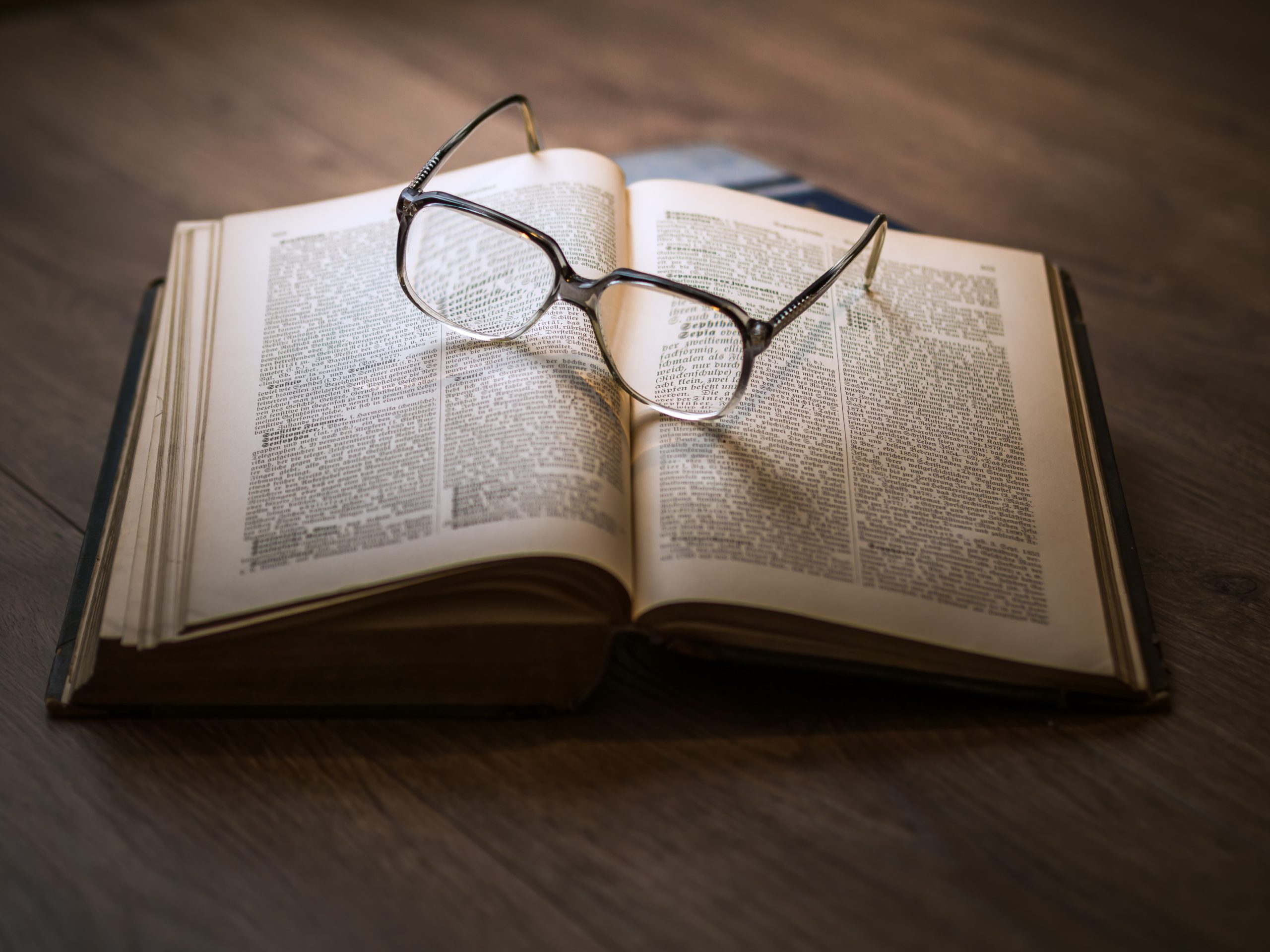 Open Book With Glasses